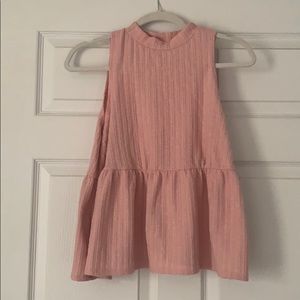 pink sleeveless top